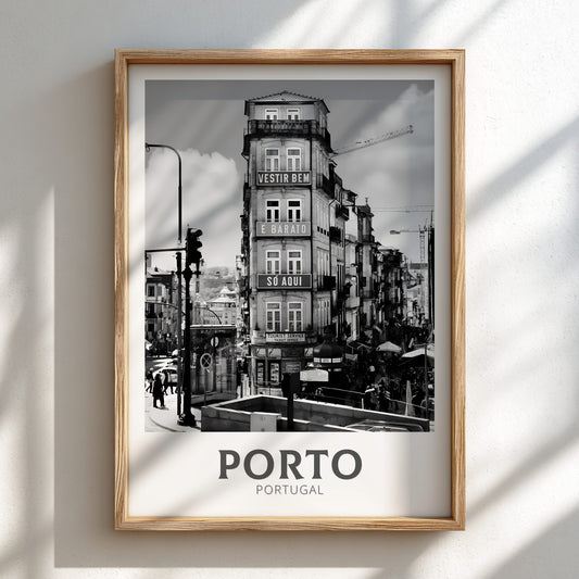 Framed black and white print of a city street scene with 'Porto, Portugal' text.