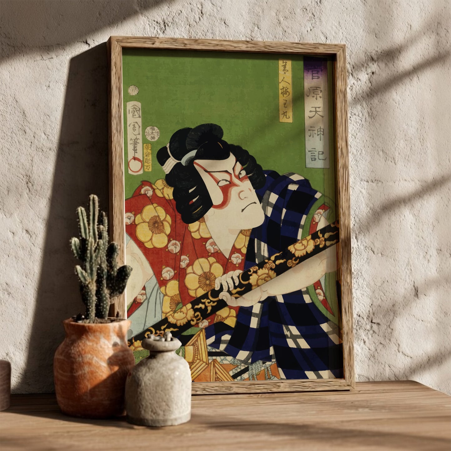 Poster of a Japanese actor in elaborate costume and makeup by Toyohara Kunichika.