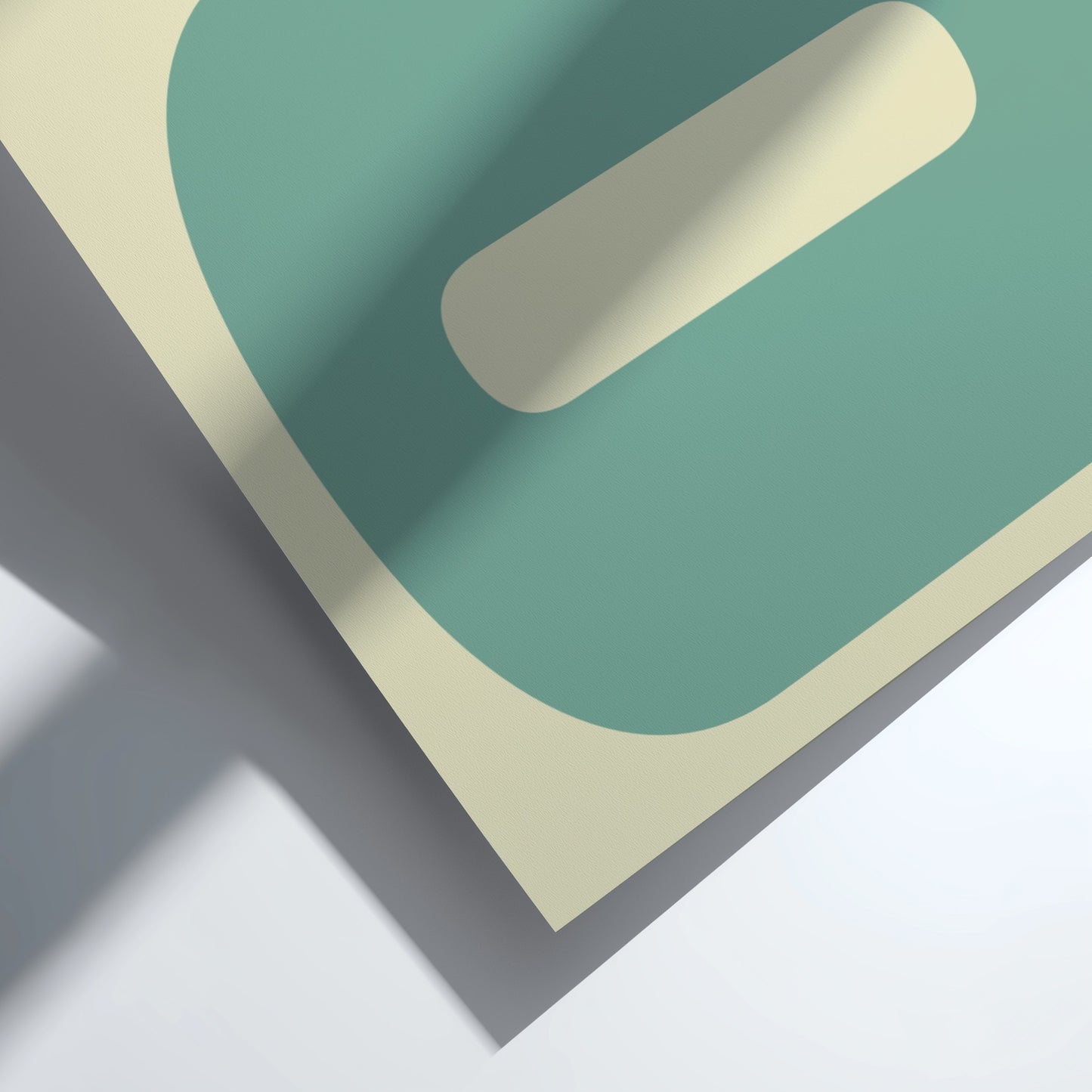 Geometric shapes in green, beige, and gray on a white background