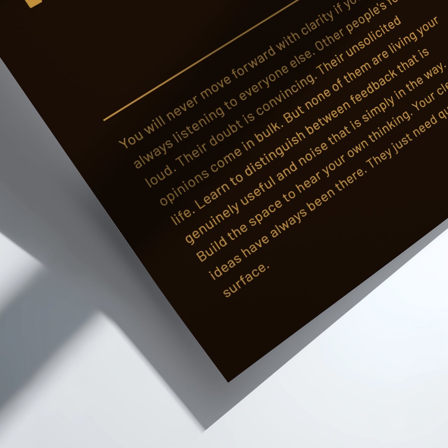 Motivational quote on a dark background with a white border