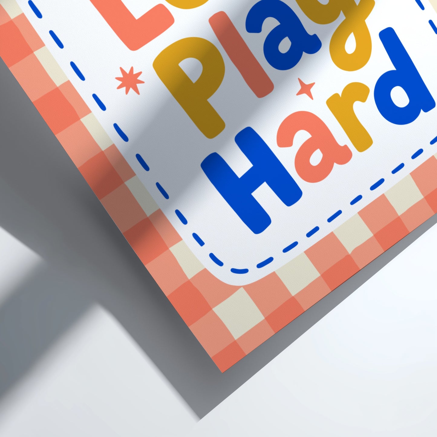 Kids room poster with colorful typography design featuring 'Laugh Loud Play Hard' for nursery decor.