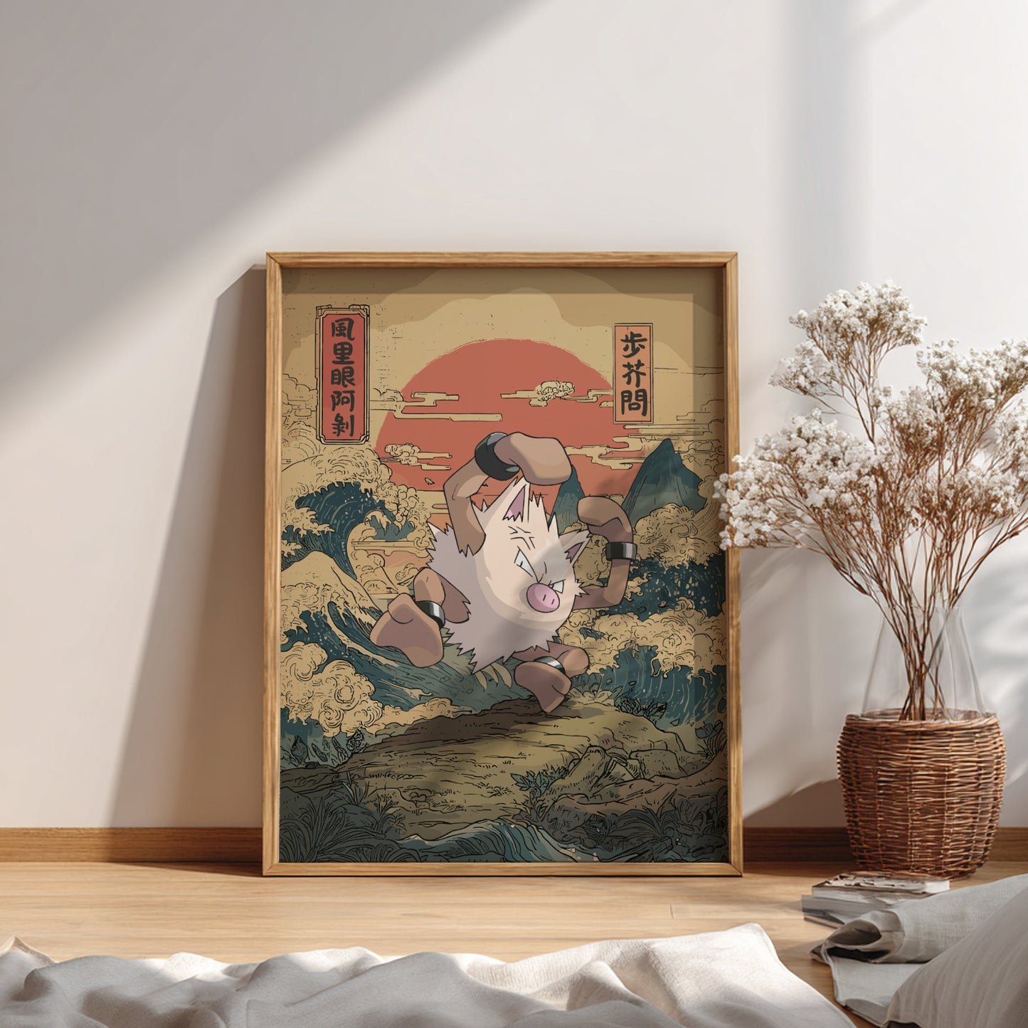 Framed artwork of Primeape Pokemon character on a wave with a sunset in the background, placed on a wooden floor.
