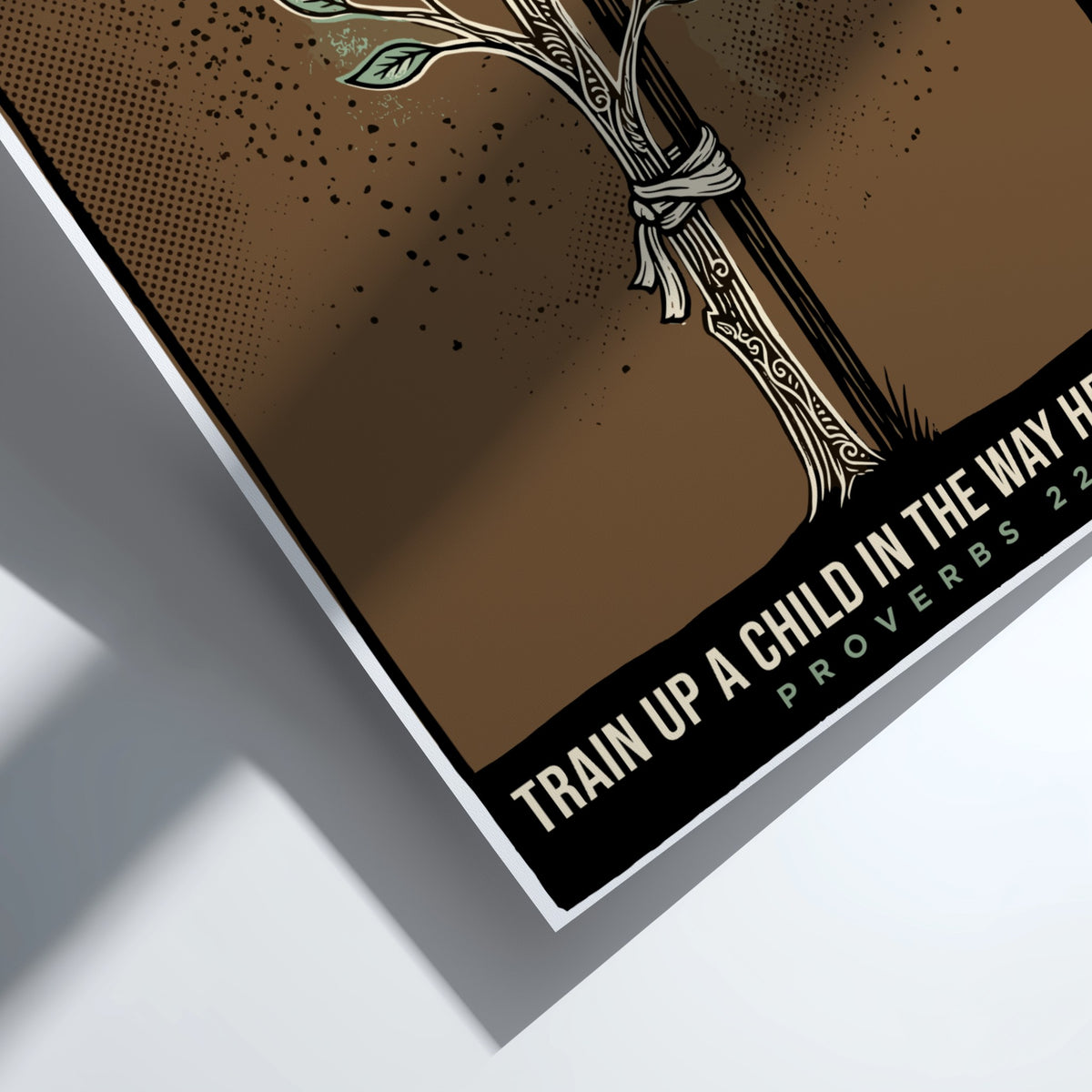 Poster featuring a sapling tied to a stake with the text Train Up A Child.