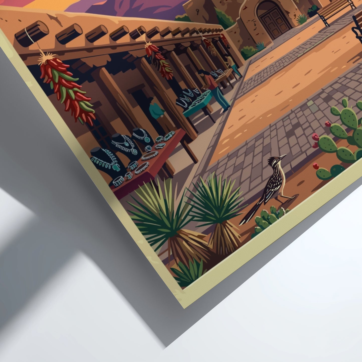 Travel poster of Santa Fe Plaza featuring adobe architecture under a vibrant sunset sky.