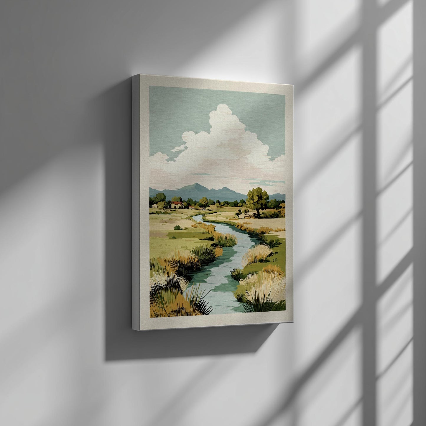 Framed landscape painting of a river and mountains on a wall with sunlight casting shadows.