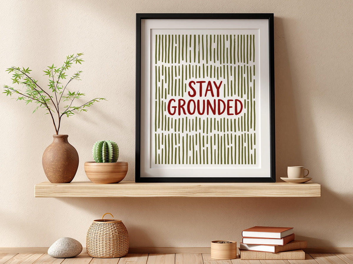 Motivational poster with Stay Grounded text over a pattern of vertical olive lines