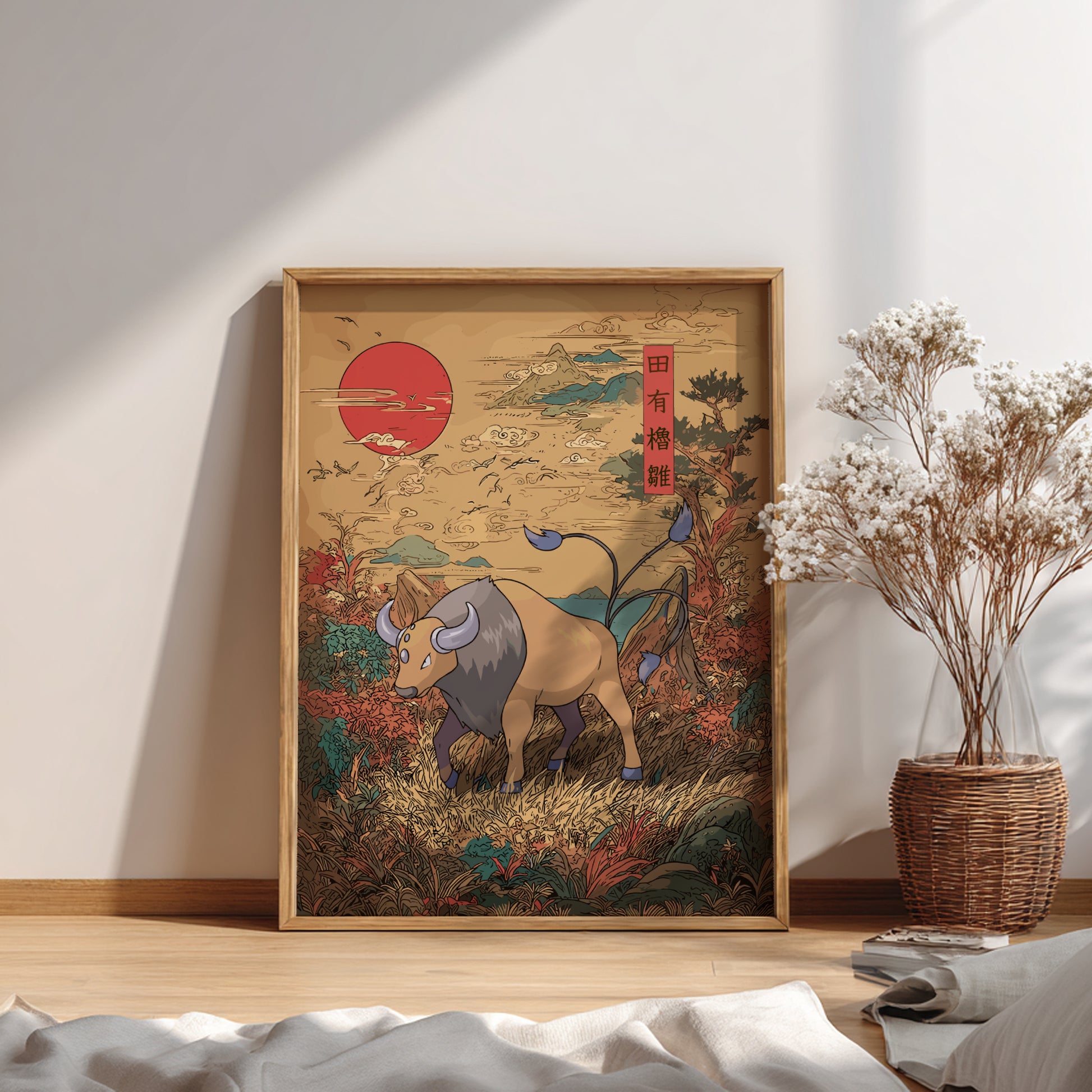 Framed artwork of Tauros Pokemon in a natural setting on a wall with a plant beside it.