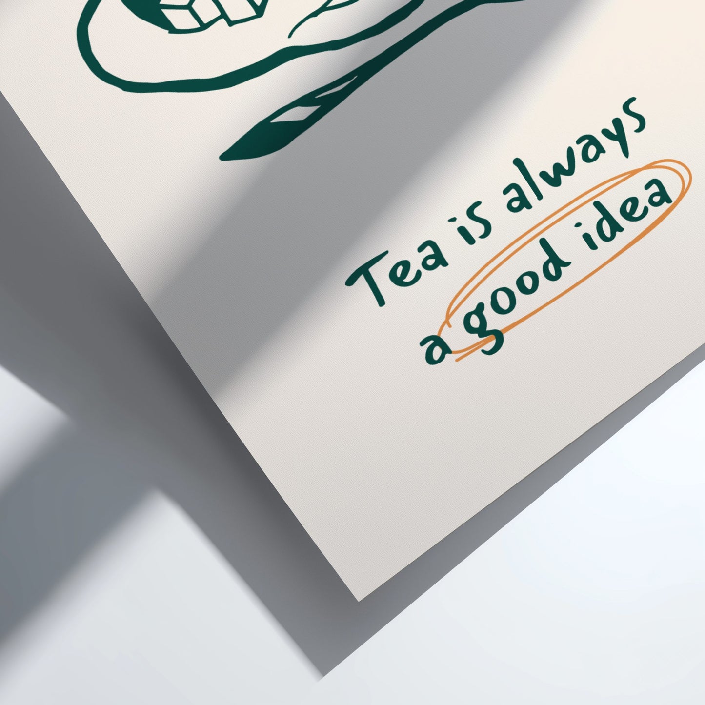 Notebook with 'Tea is always a good idea' text on a white background