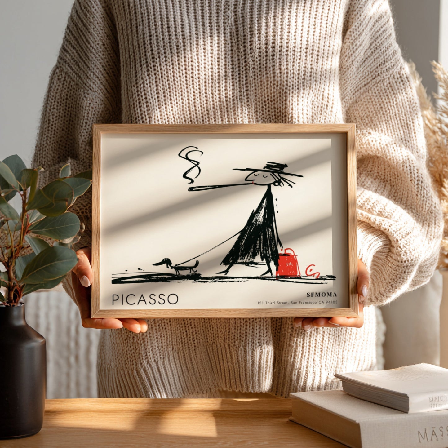 Pablo Picasso poster featuring The Acrobat in black and white with red accents
