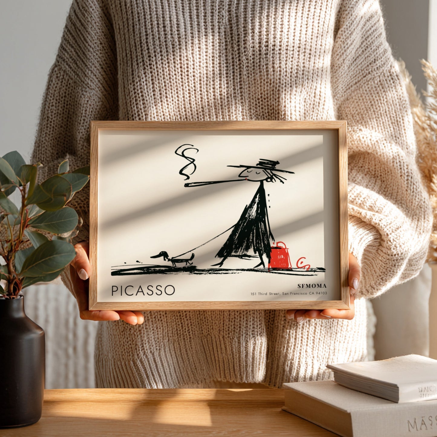 Wall art print featuring a playful black and white illustration by Pablo Picasso with an acrobat theme.