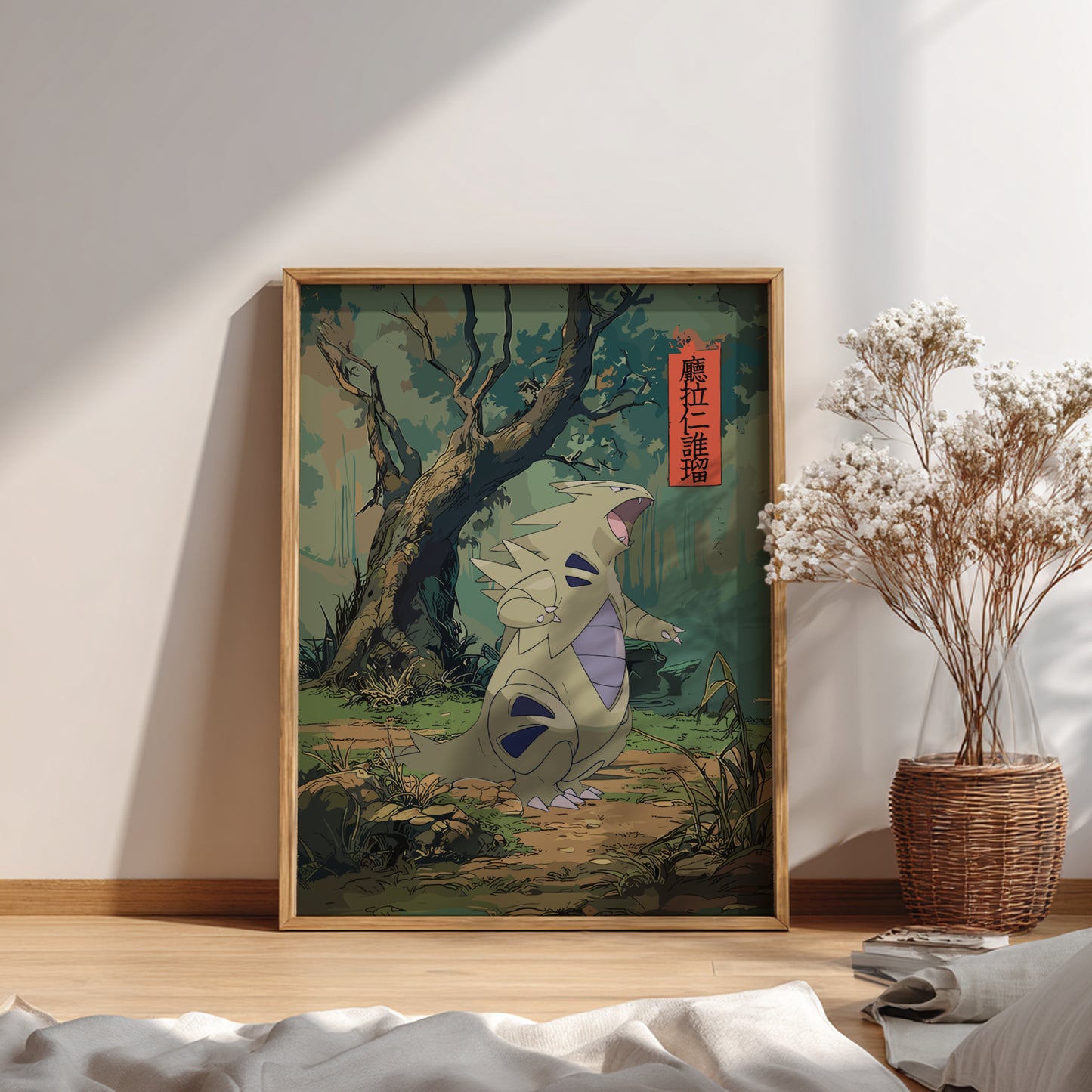 Framed artwork of Tyranitar Pokemon in a natural setting on a wall.