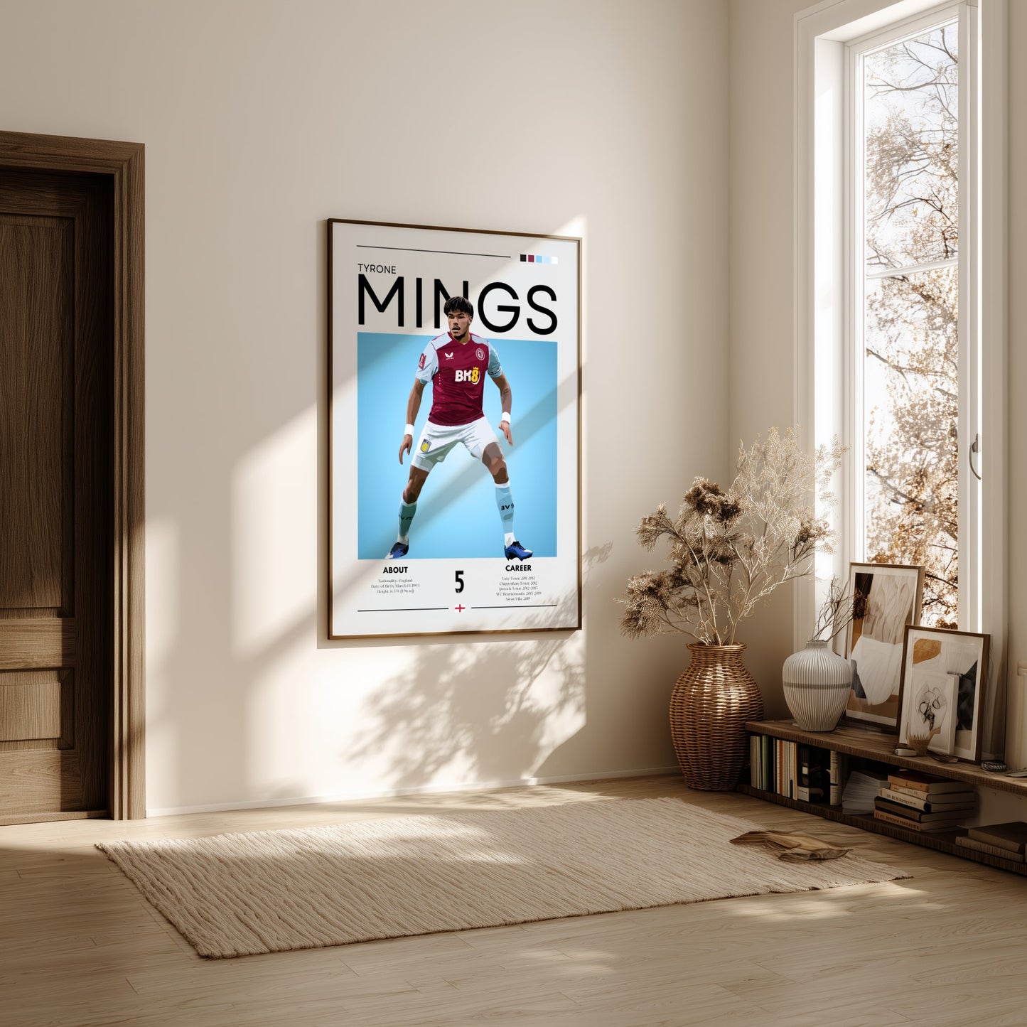 Framed sports poster of a player on a wall in a bright room with natural light.