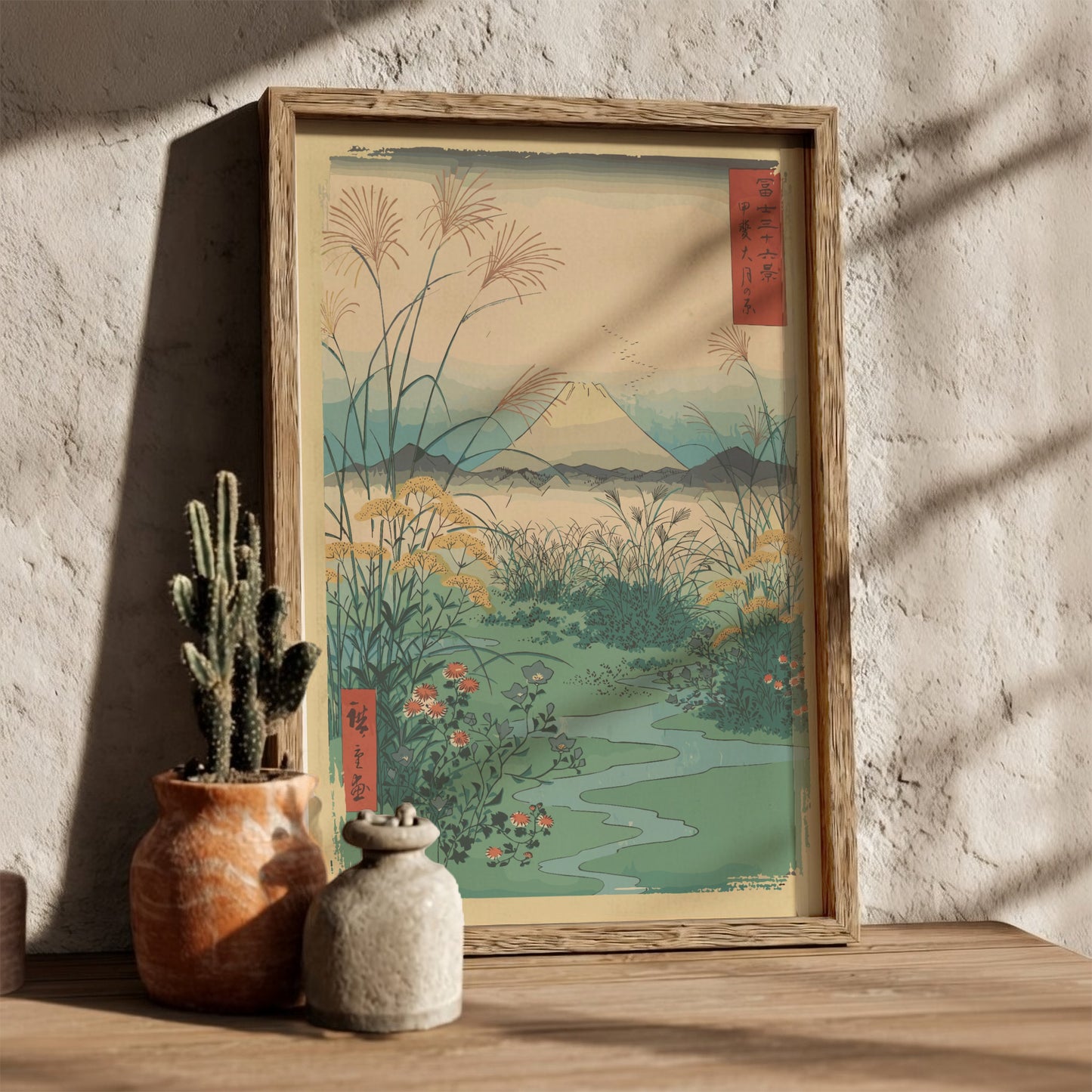 Japanese art poster of Mount Fuji with pampas grass and wildflowers, in a muted color palette.