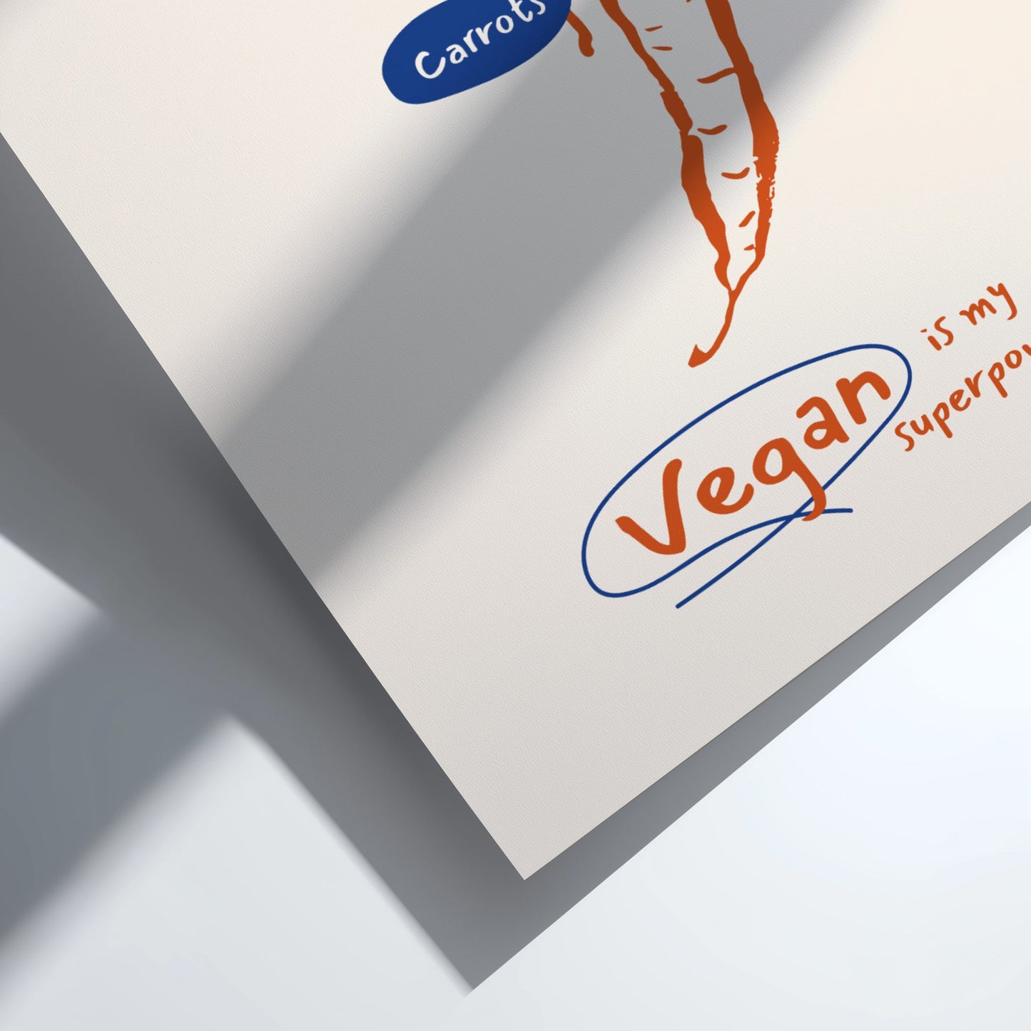 Sheet of paper with 'Vegan is my superpower' text and a carrot illustration on a white background.