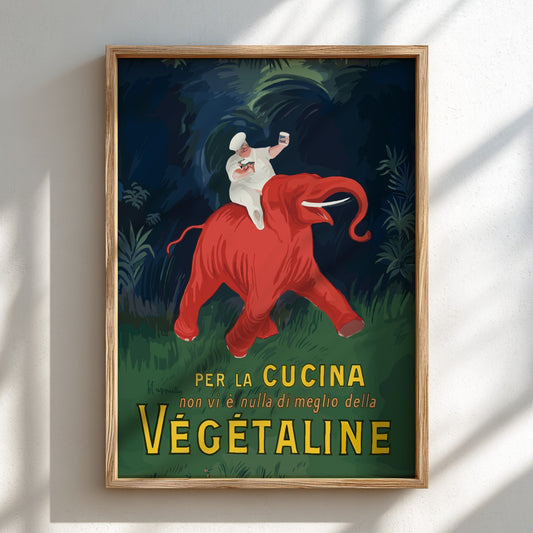 Vintage Vegetaline poster by Leonetto Cappiello featuring a chef on a red elephant. Art Nouveau style.