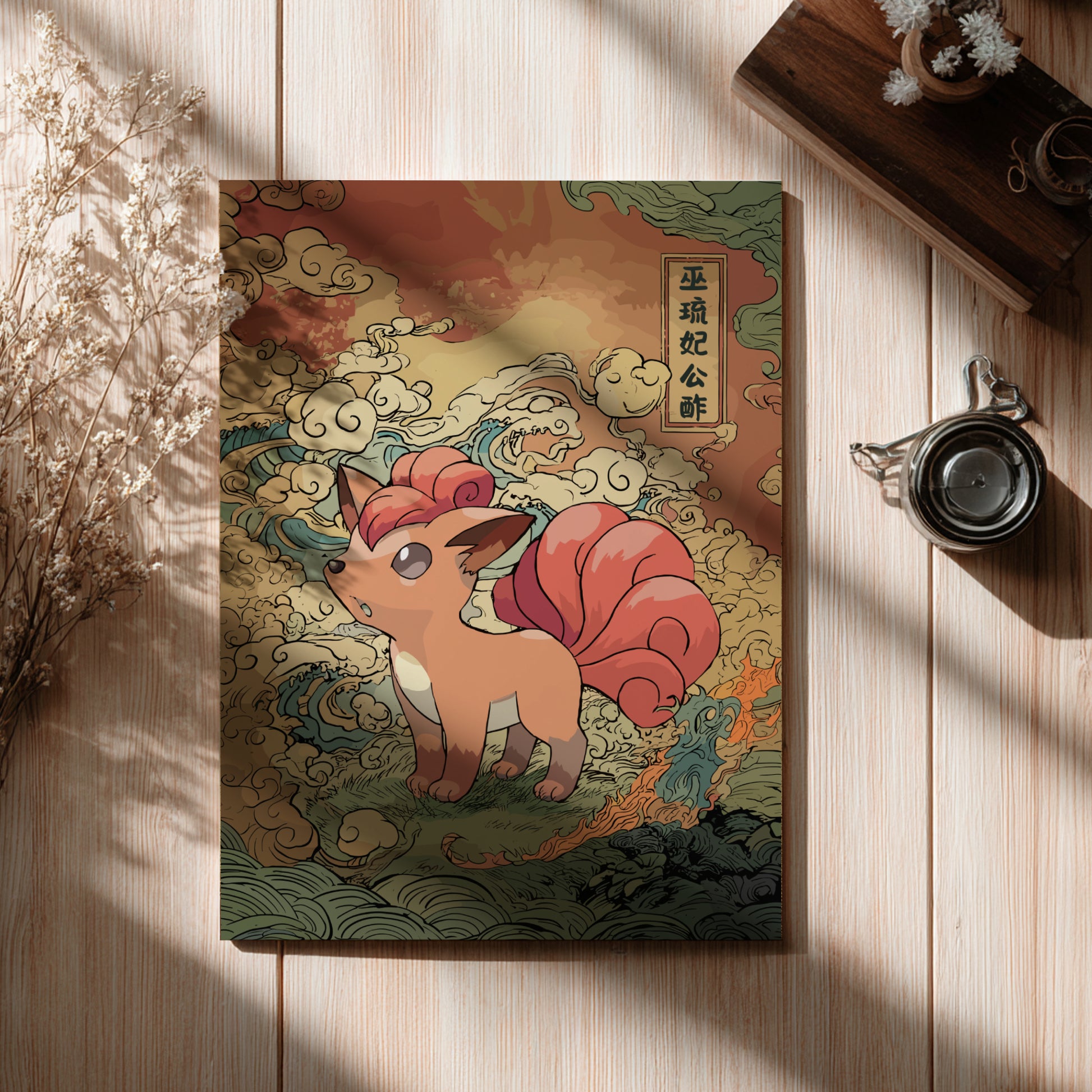 Poster with Vulpix Pokemon illustration on a wooden surface