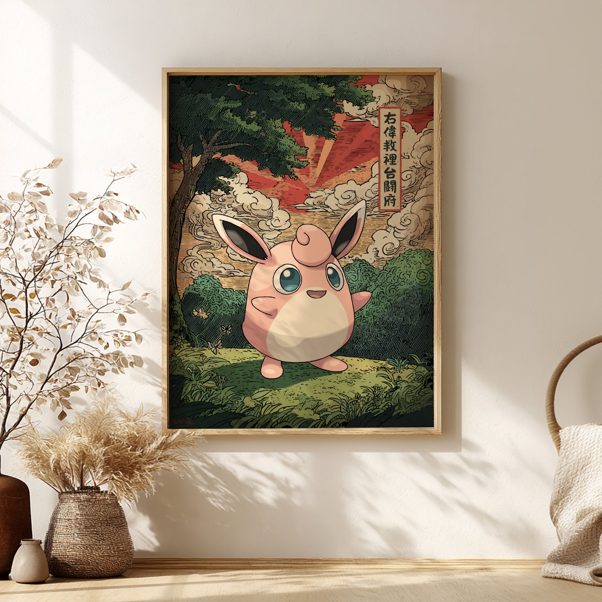 Framed artwork of Wigglytuff Pokemon character in a natural setting on a wall.