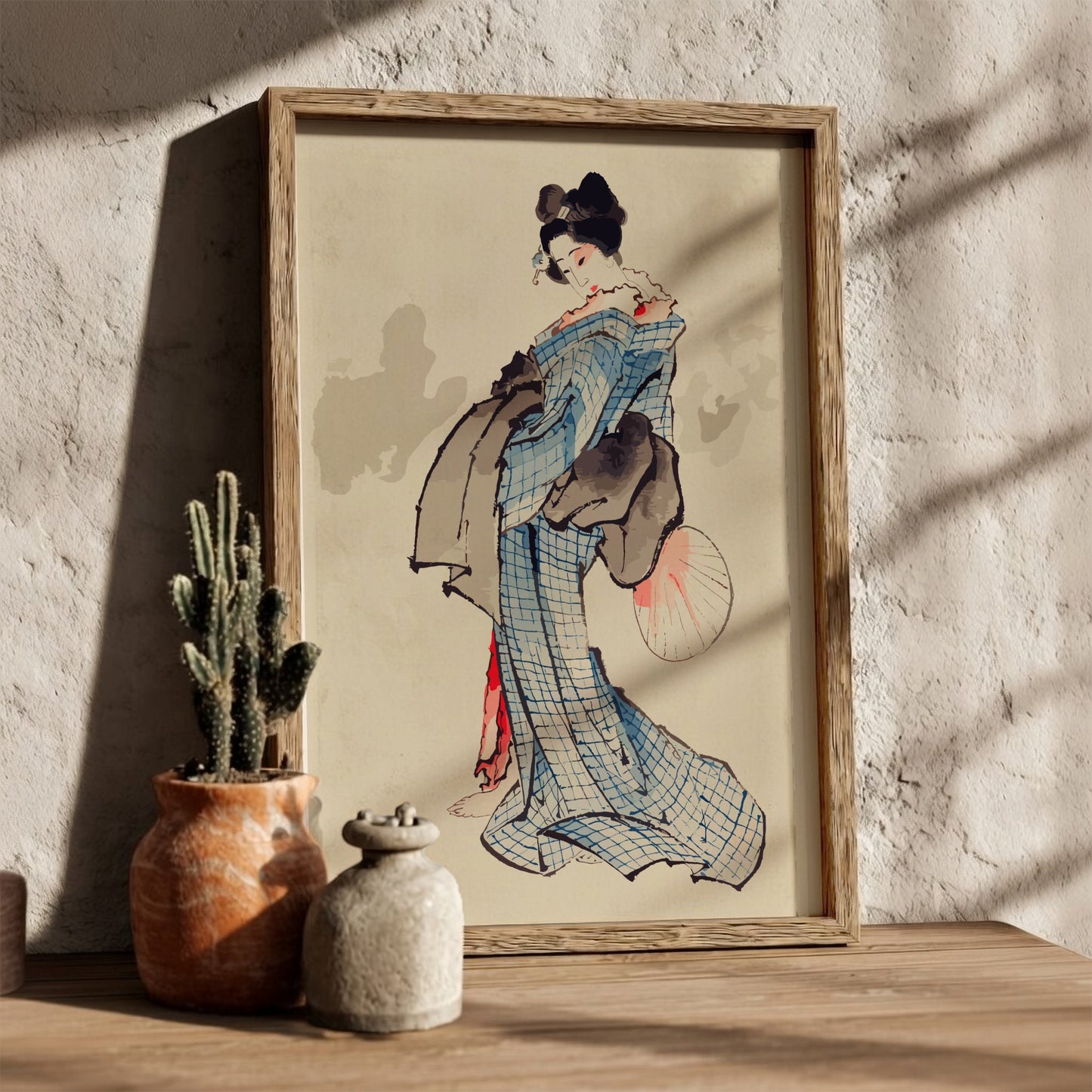Famous art poster of a geisha in a blue kimono holding a fan, Ukiyo-e style.