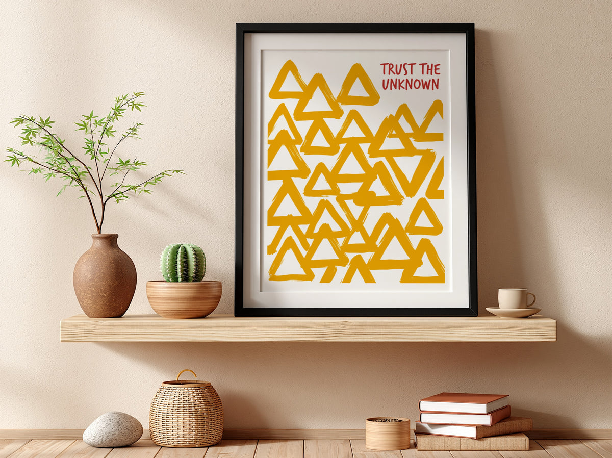 Motivational poster featuring hand-painted yellow triangles and the text Trust The Unknown above.