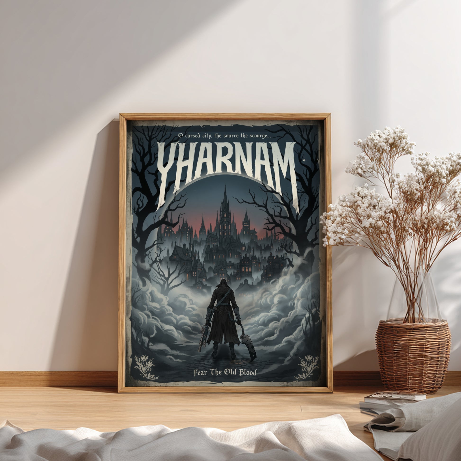 Framed poster of 'Yharnam' with a dark castle and silhouette on a wall.