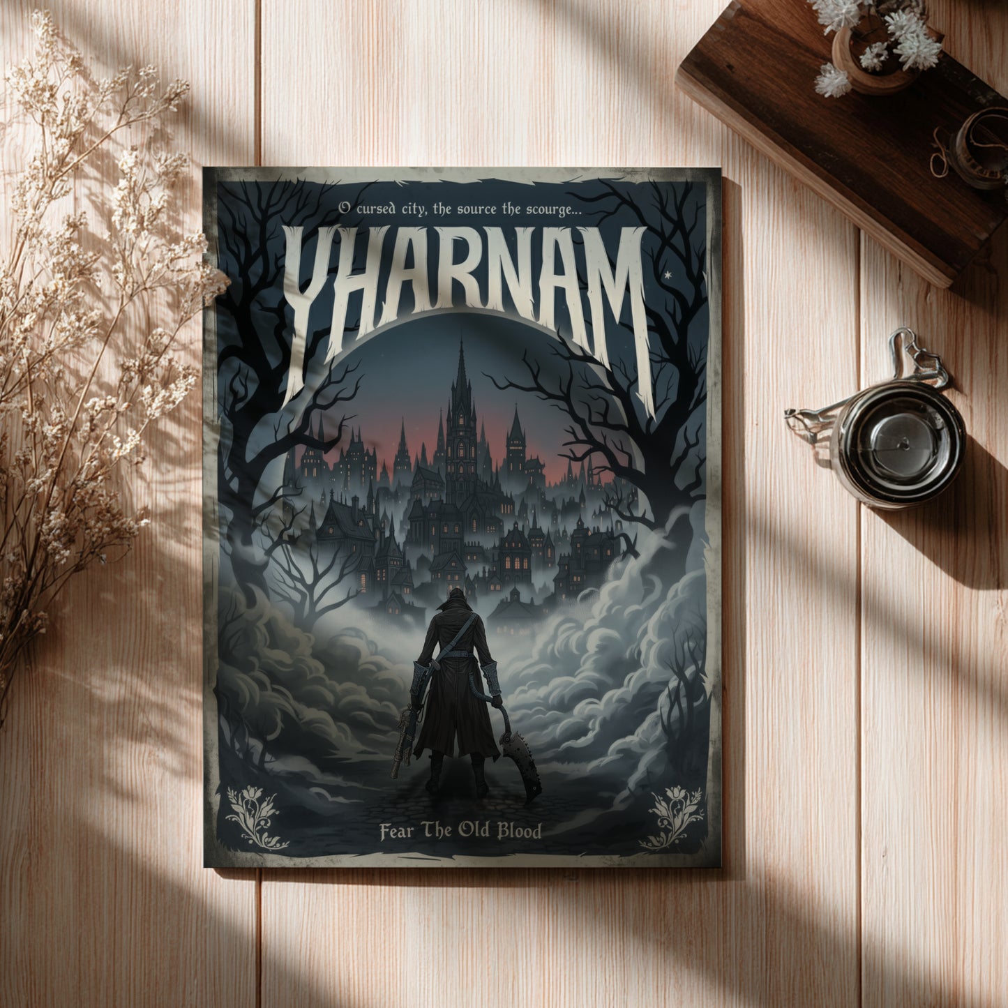 Book titled 'Yharnam' with a dark cover featuring a castle and silhouette on a wooden surface.