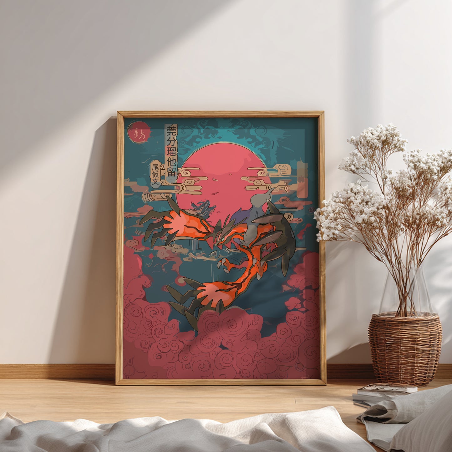 Framed artwork with a Yveltal Pokemon design on a wall in a room with a vase of flowers.