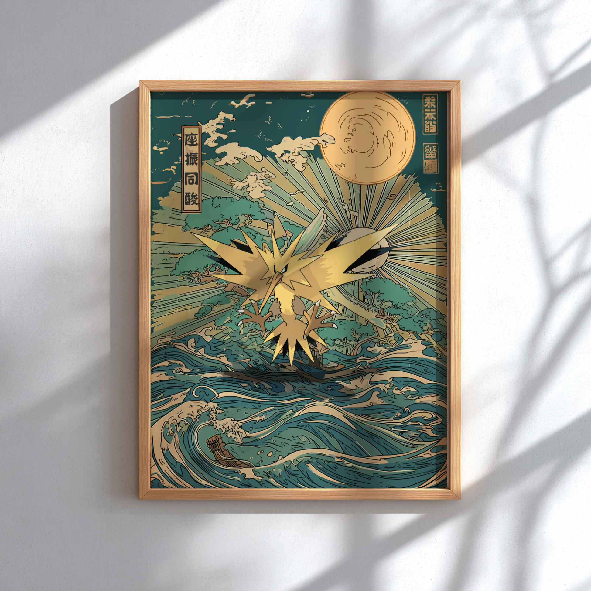 Framed artwork with a gold and teal design of Zapdos Pokemon and moon on a white wall.