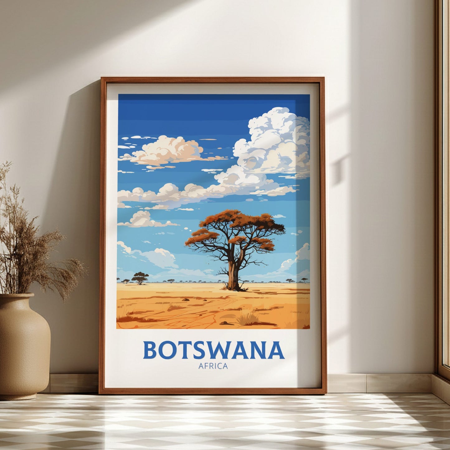 Framed artwork of a landscape with 'Botswana, Africa' text on a wall.