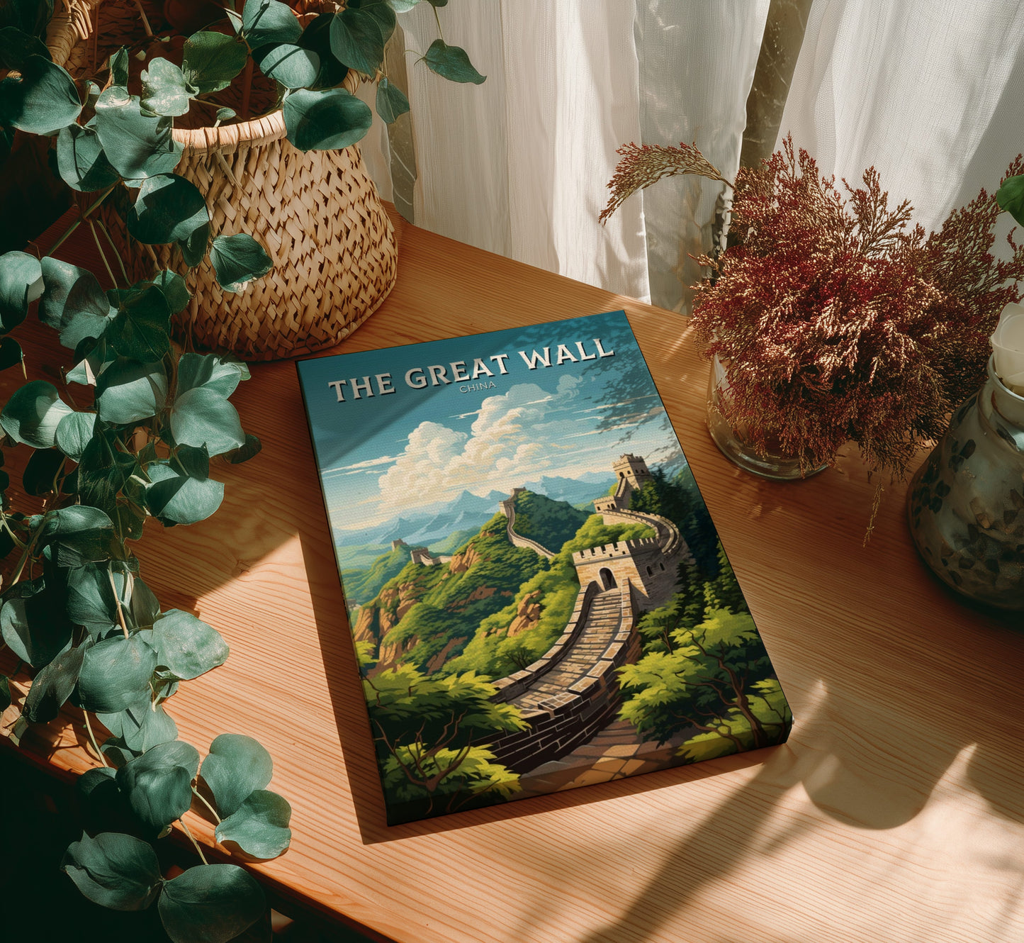 Book titled 'The Great Wall' on a wooden surface with plants around