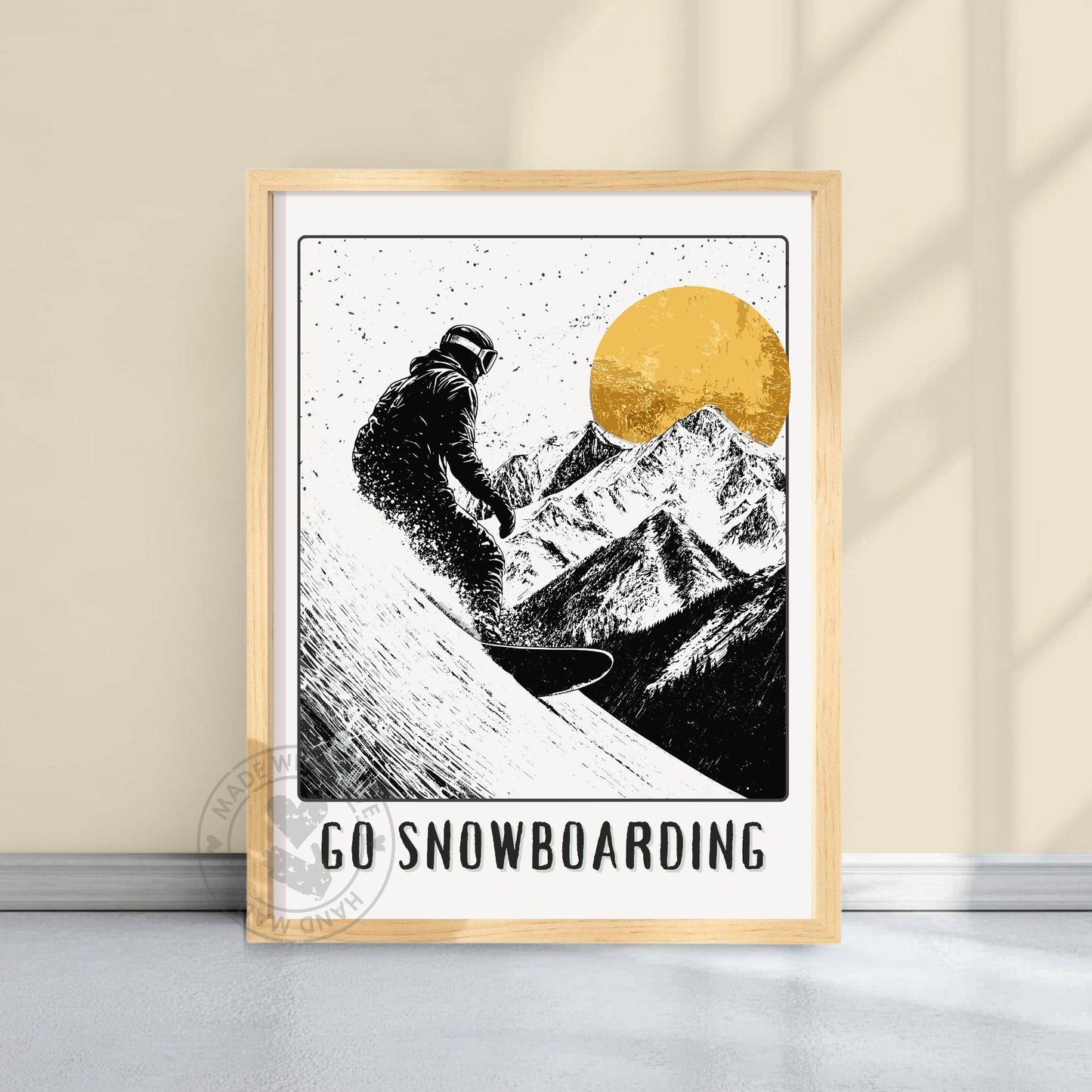 Go Snowboarding Poster on a yellow wall background