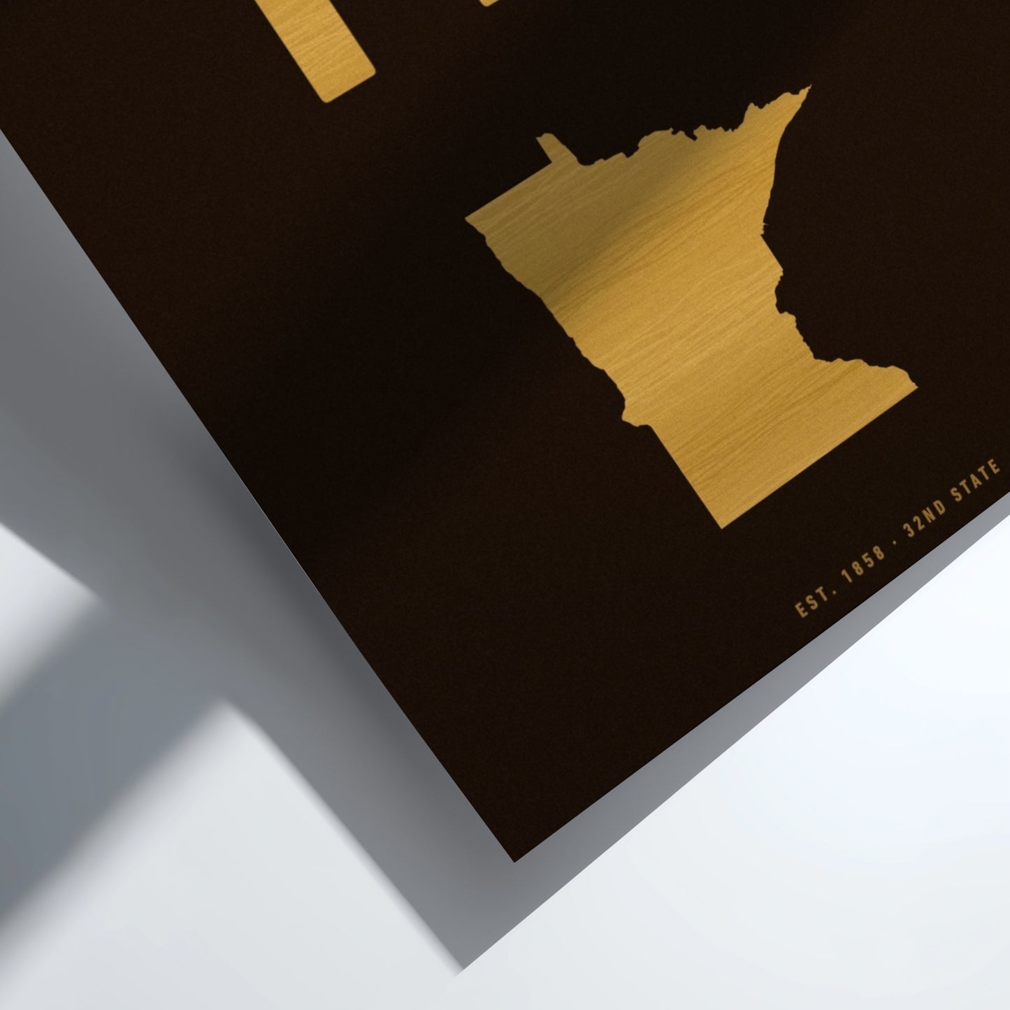 Gold state outline on a black background