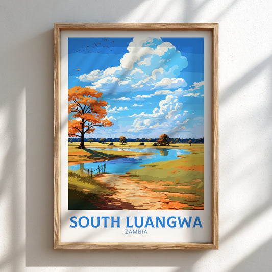 Framed artwork of a scenic landscape with 'South Luangwa, Zambia' text on a white wall.