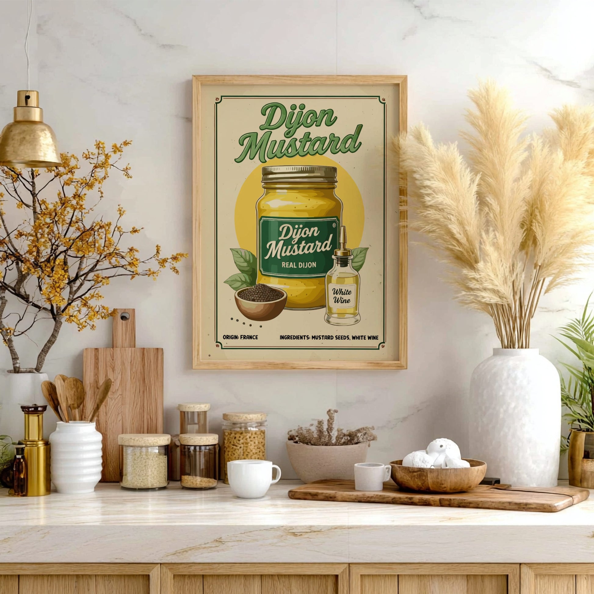 Framed Dijon Mustard poster on a kitchen wall with various kitchen items below.
