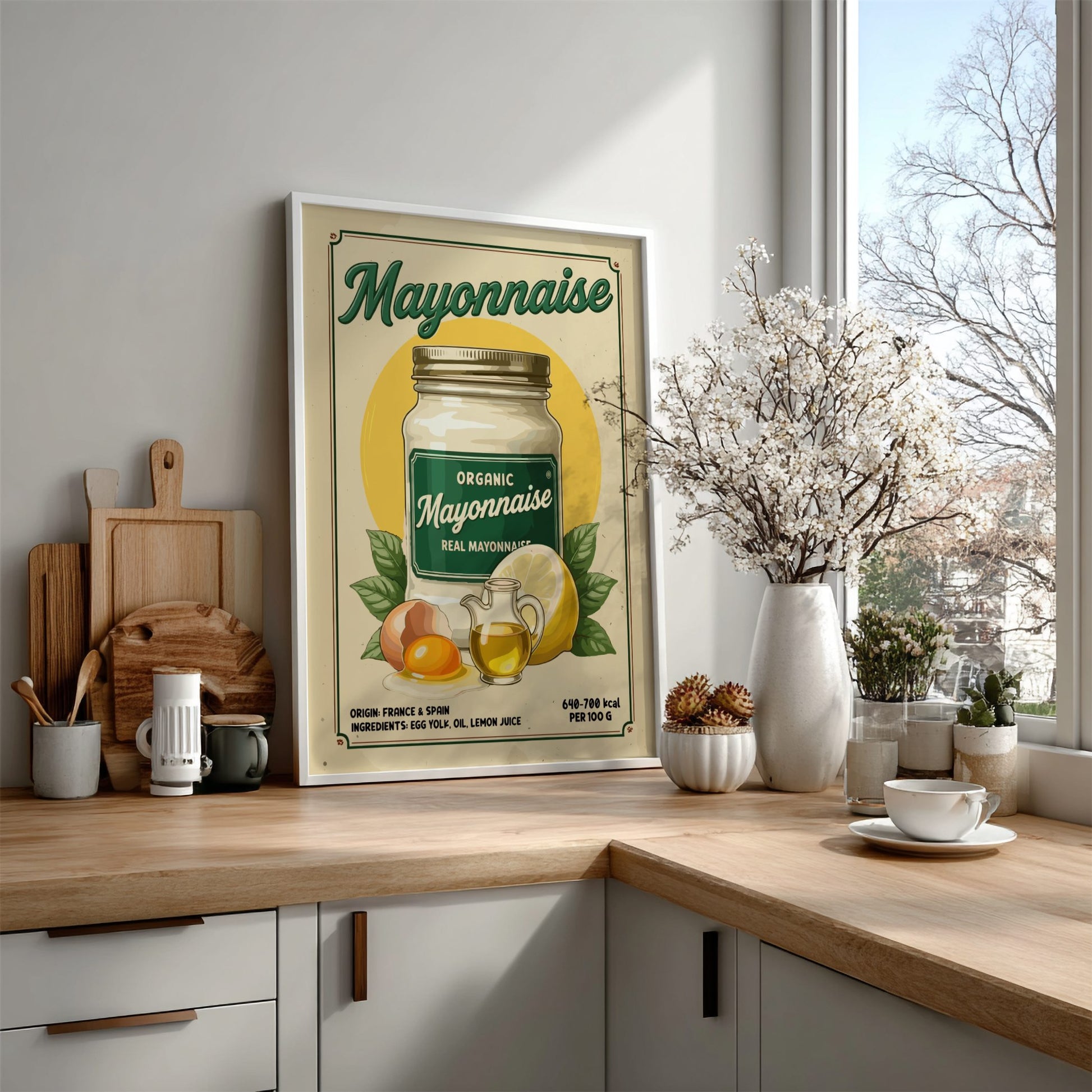 Kitchen counter with a vintage-style mayonnaise jar poster, wooden cutting boards, and decorative items.
