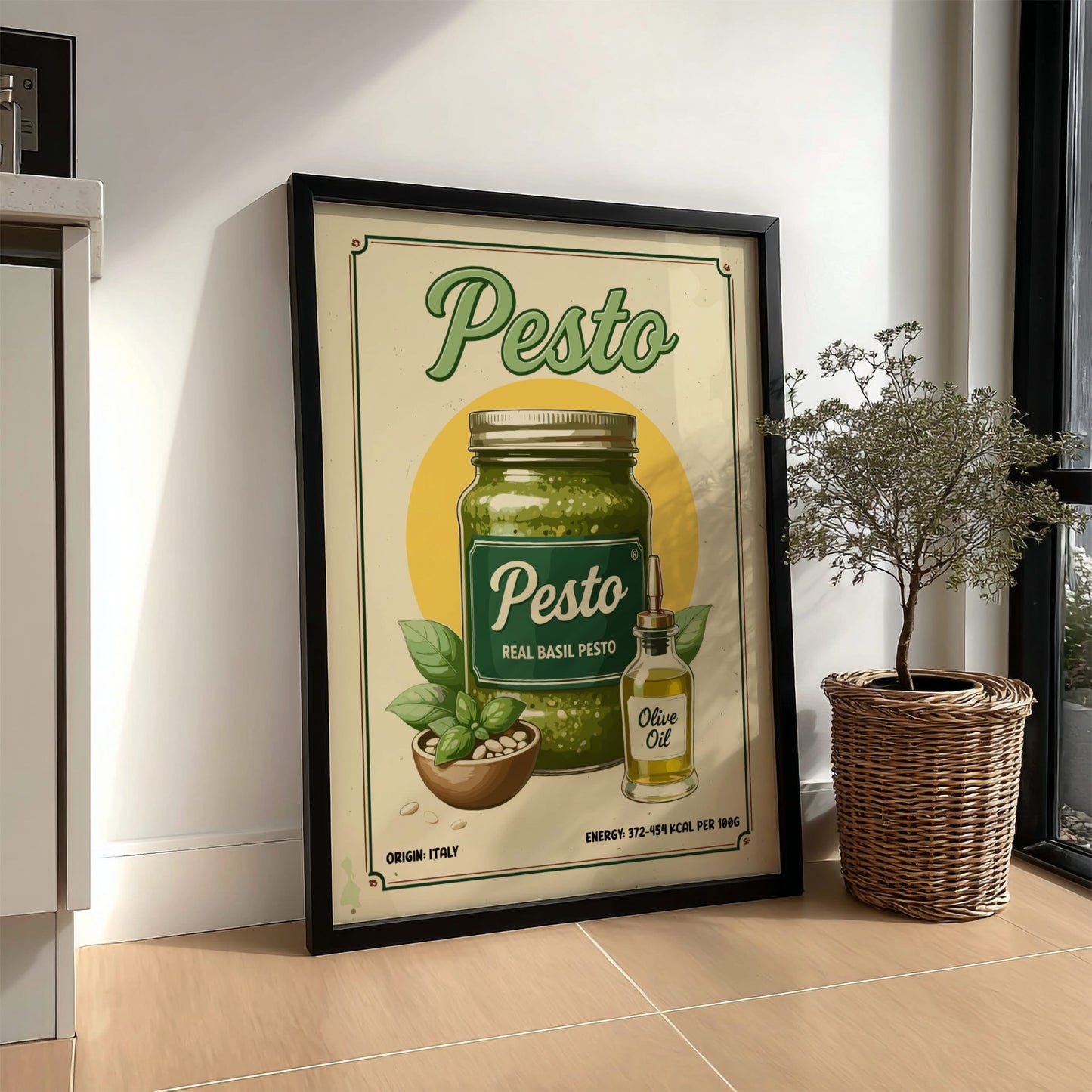 Framed poster of pesto with a jar and bottle on a wall in a room.