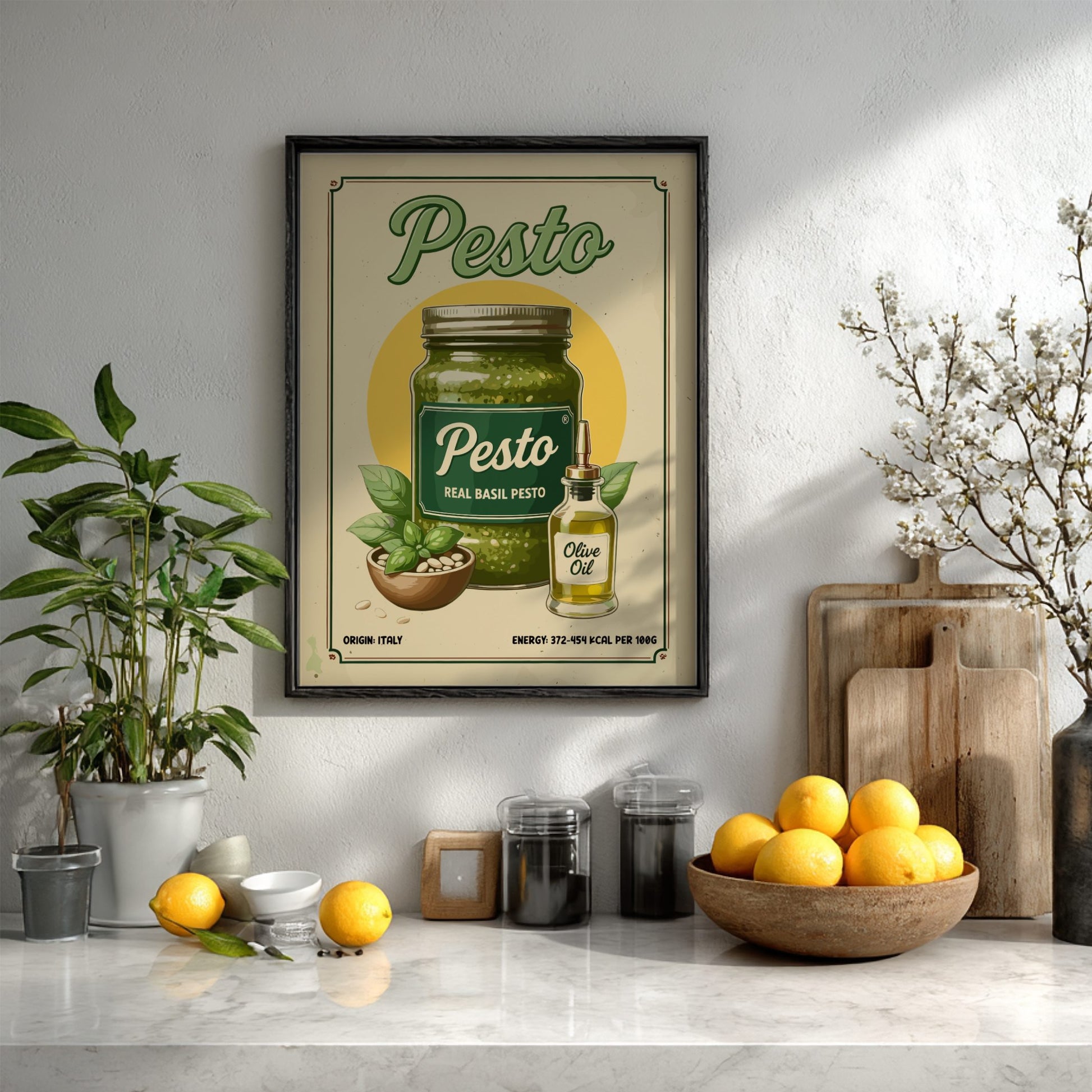 Framed pesto poster on a kitchen wall with lemons and plants.