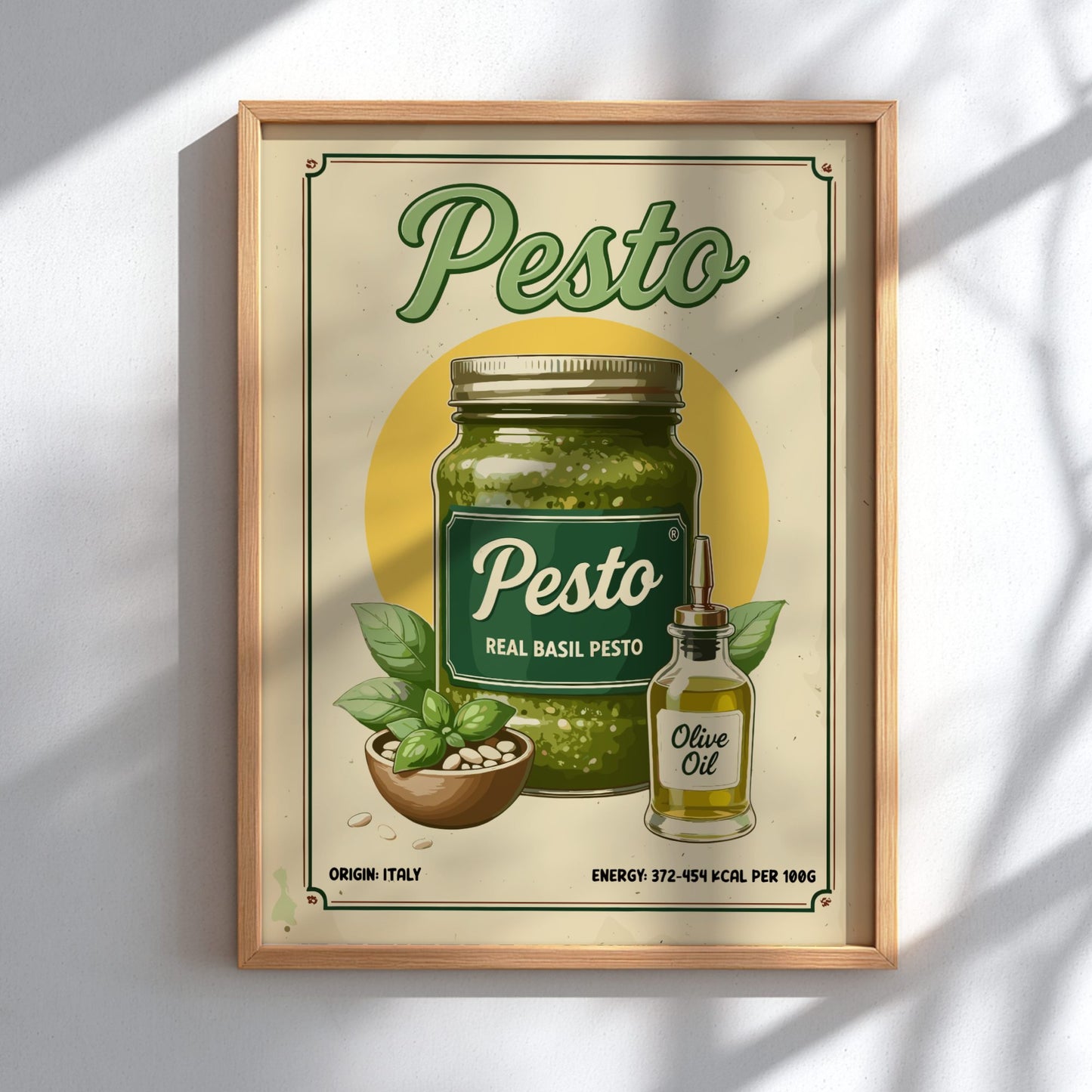Framed poster of a pesto jar with basil and olive oil on a light background