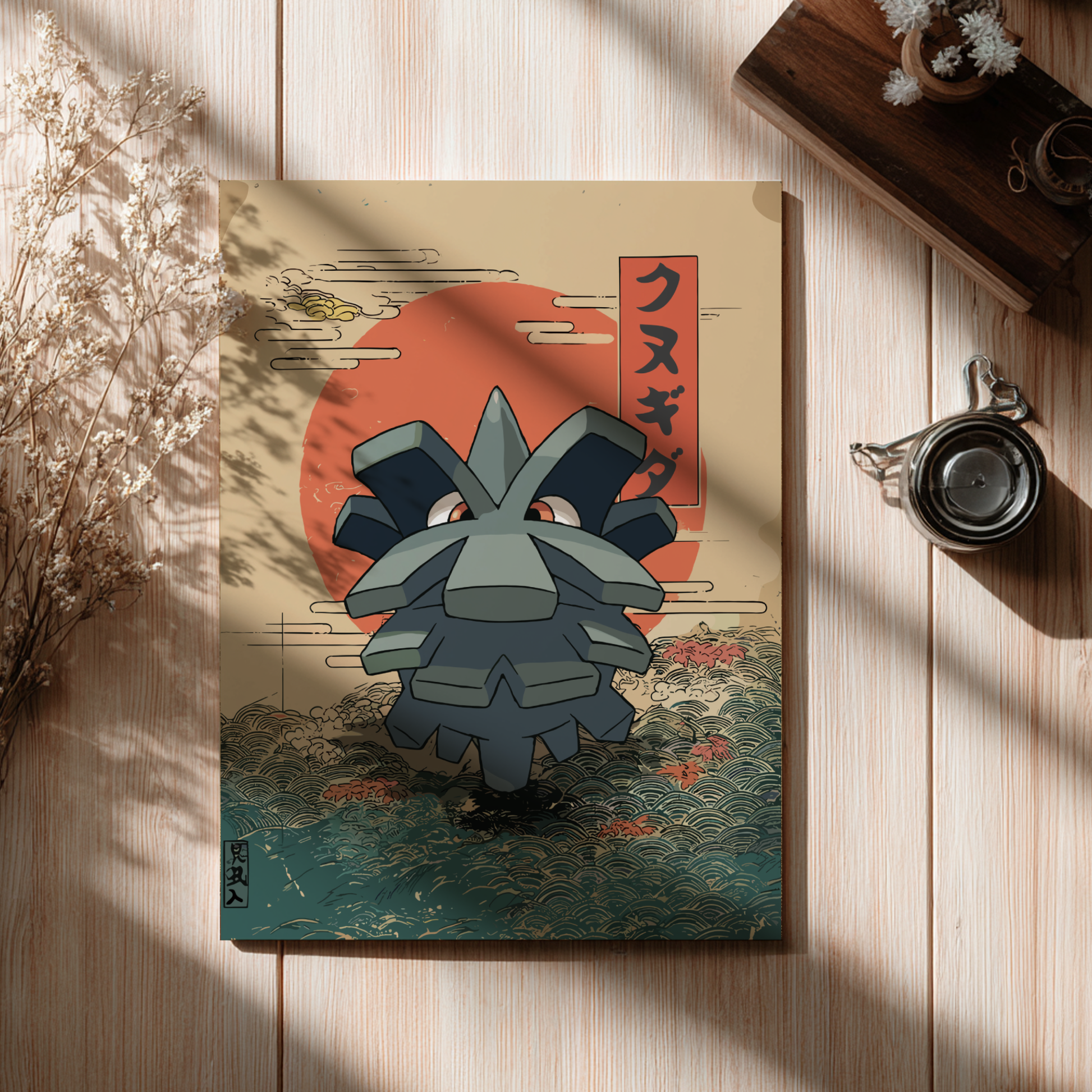 Canvas print with a stylized Pineco Pokemon in front of a red sun and Japanese text, placed on a wooden surface.