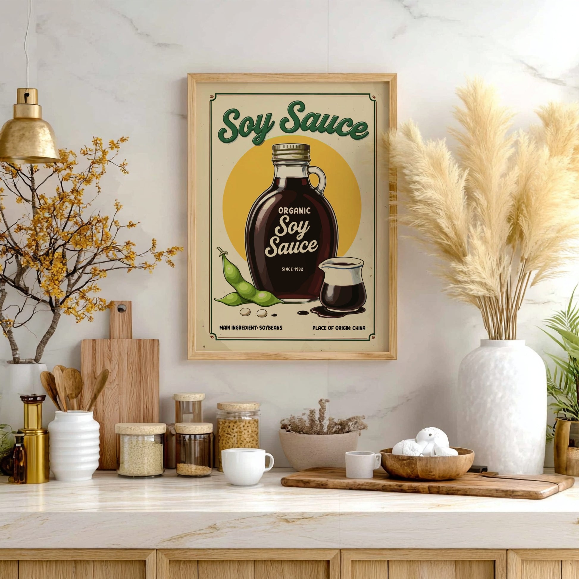 Framed soy sauce poster on a kitchen wall with various kitchen items below.