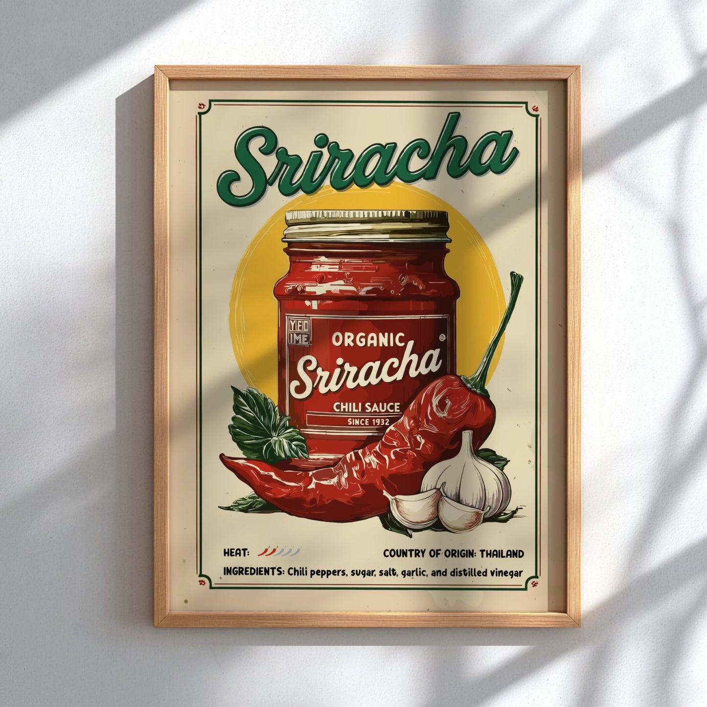Framed poster of a Sriracha bottle with chili peppers and garlic on a light background