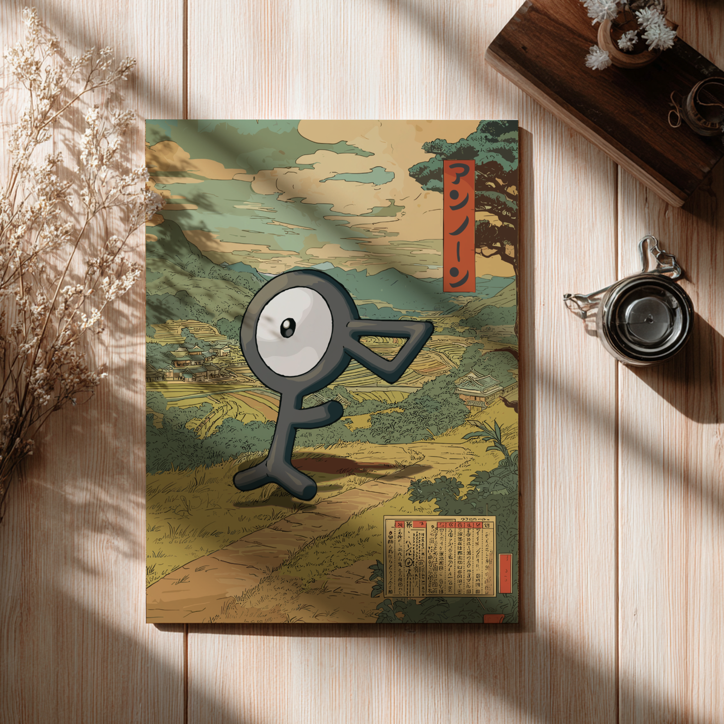 Canvas print with a stylized Unown Pokemon character and landscape on a wooden surface