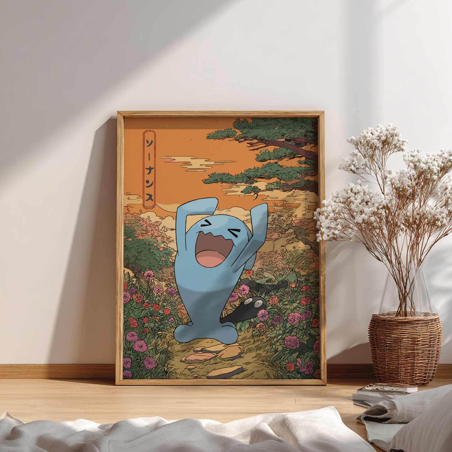 Framed artwork of Wobbuffet Pokemon character in a scenic setting on a wall.