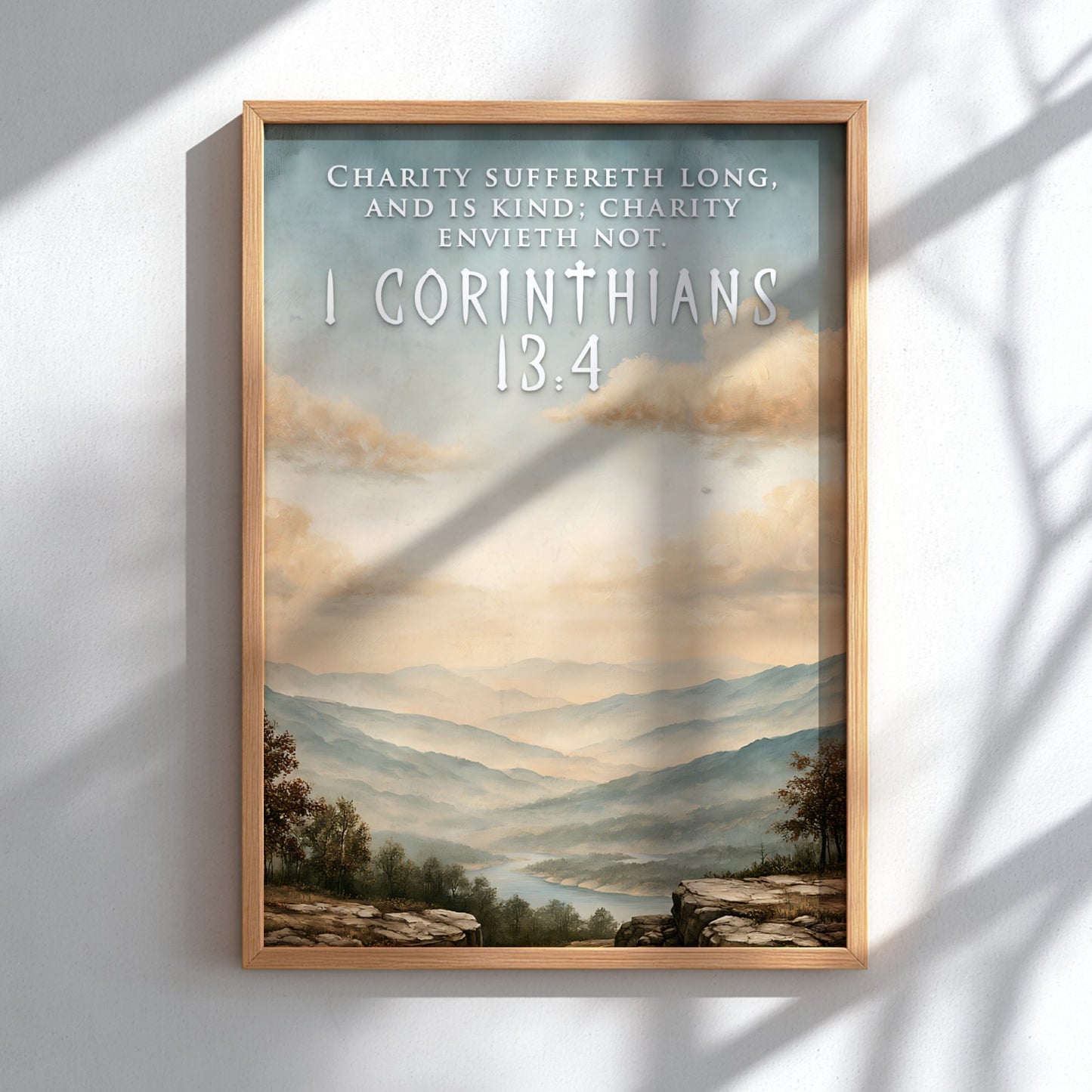 Poster featuring a serene mountain landscape with 1 Corinthians 13:4 text in soft colours