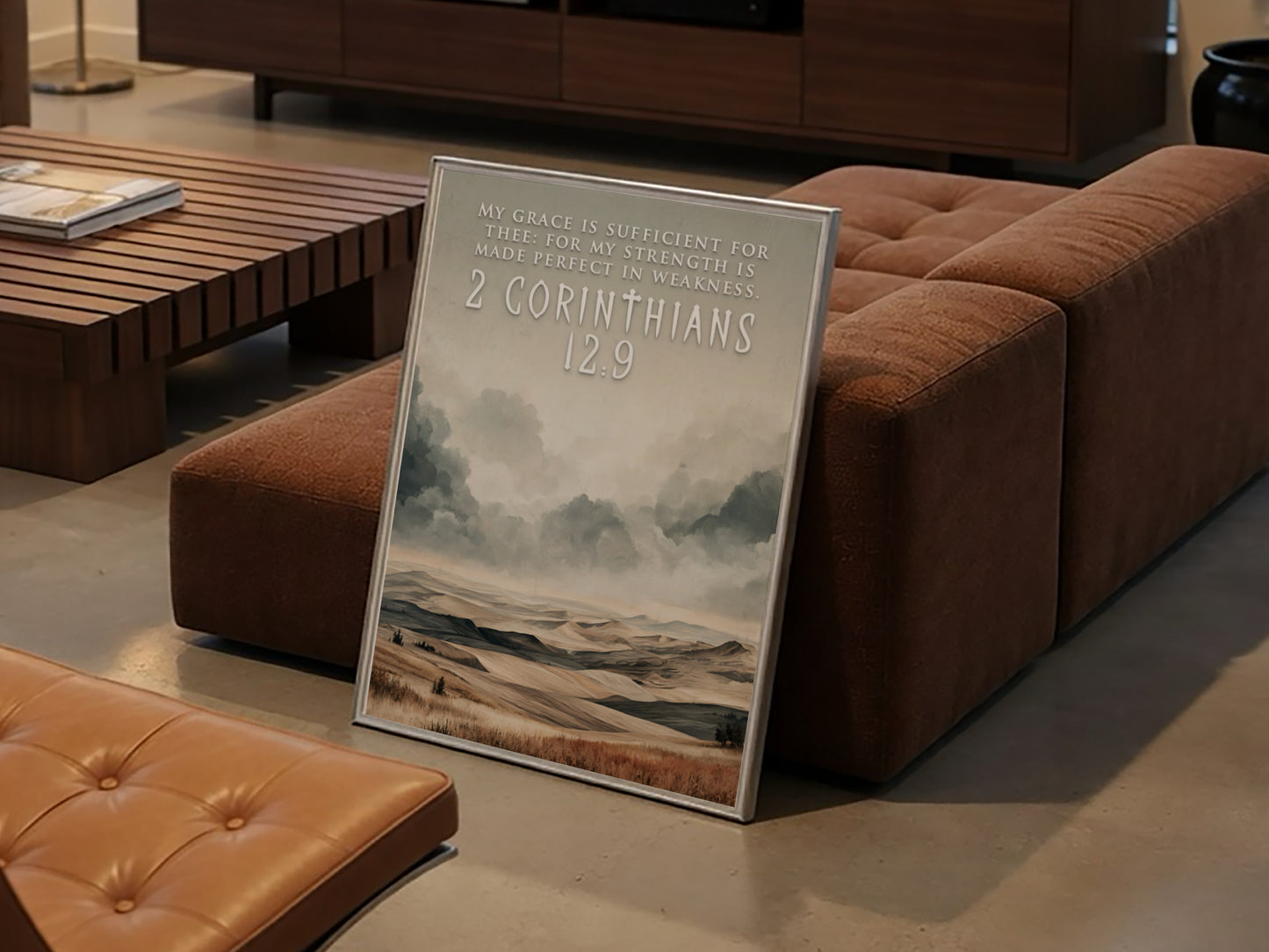 Poster featuring rolling hills and cloudy skies with 2 Corinthians 12:9 text overlay.