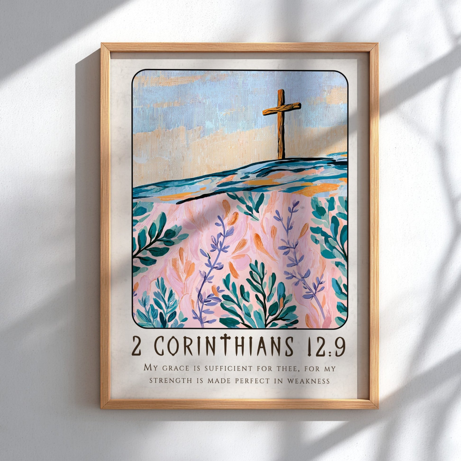 Christian poster featuring 2 Corinthians 12:9 with a cross and floral design in pastel colors