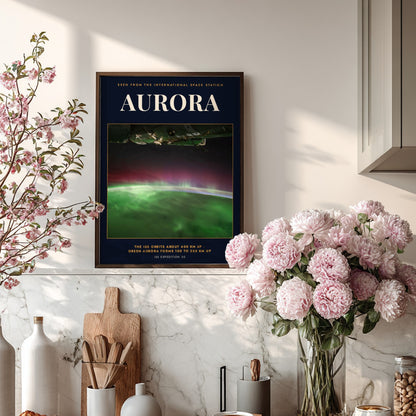 Poster featuring a vibrant green aurora glowing above the curved Earth from space view