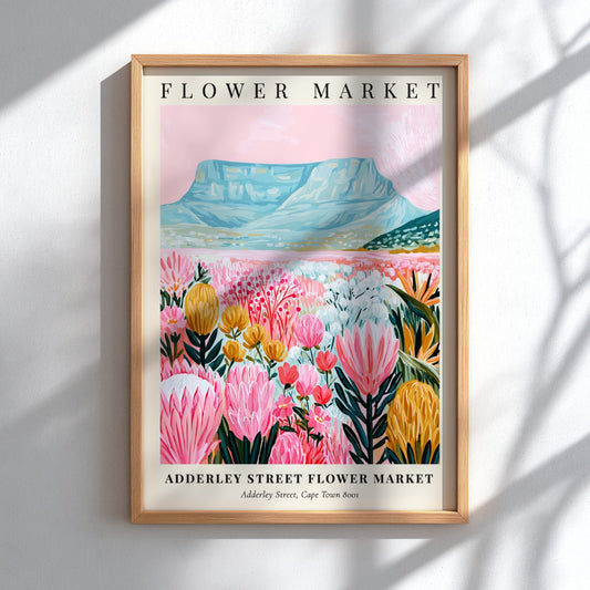 Floral print featuring vibrant pink flowers and a mountain backdrop, perfect for home decor and wall art.