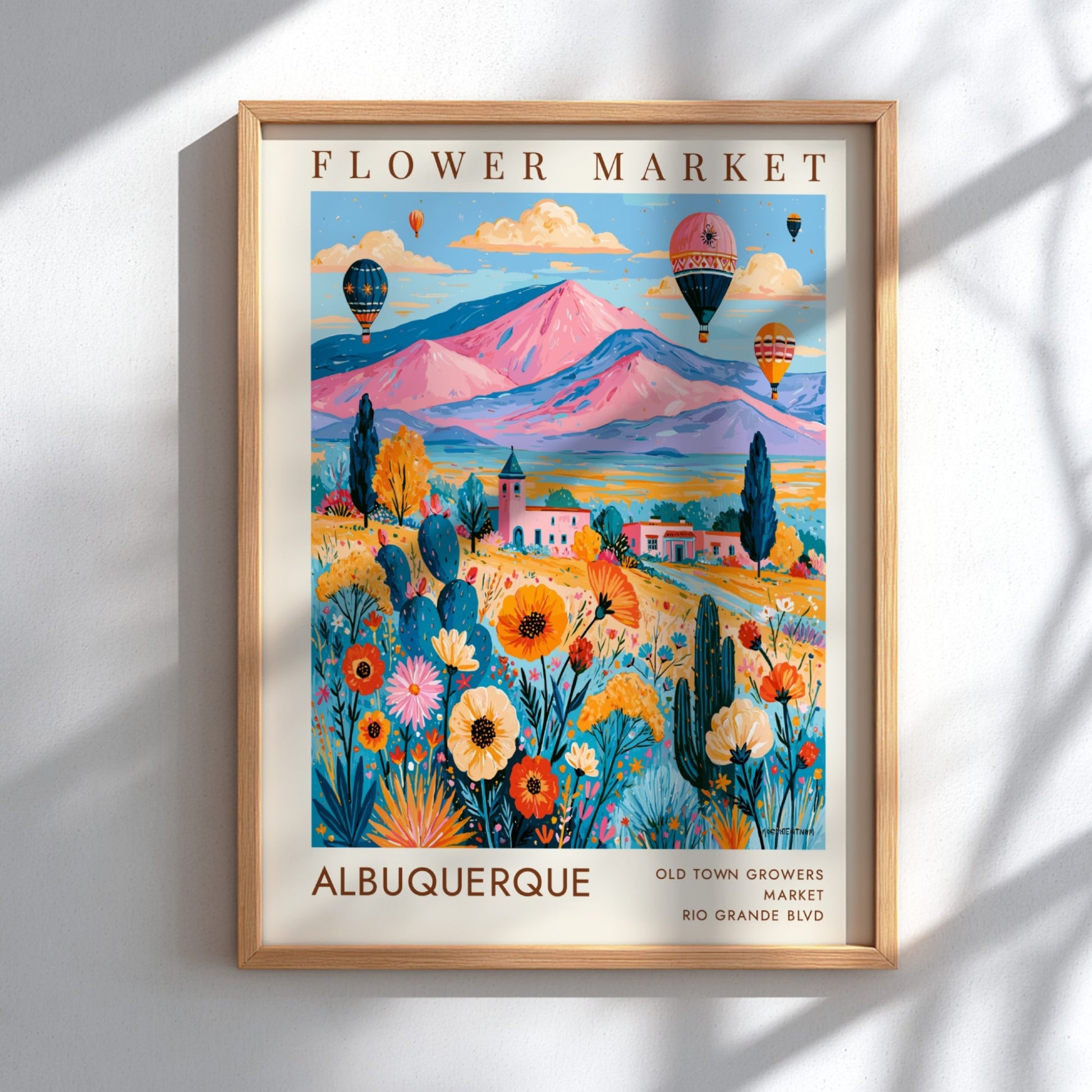 Flower market poster featuring colorful flowers and hot air balloons in Albuquerque landscape