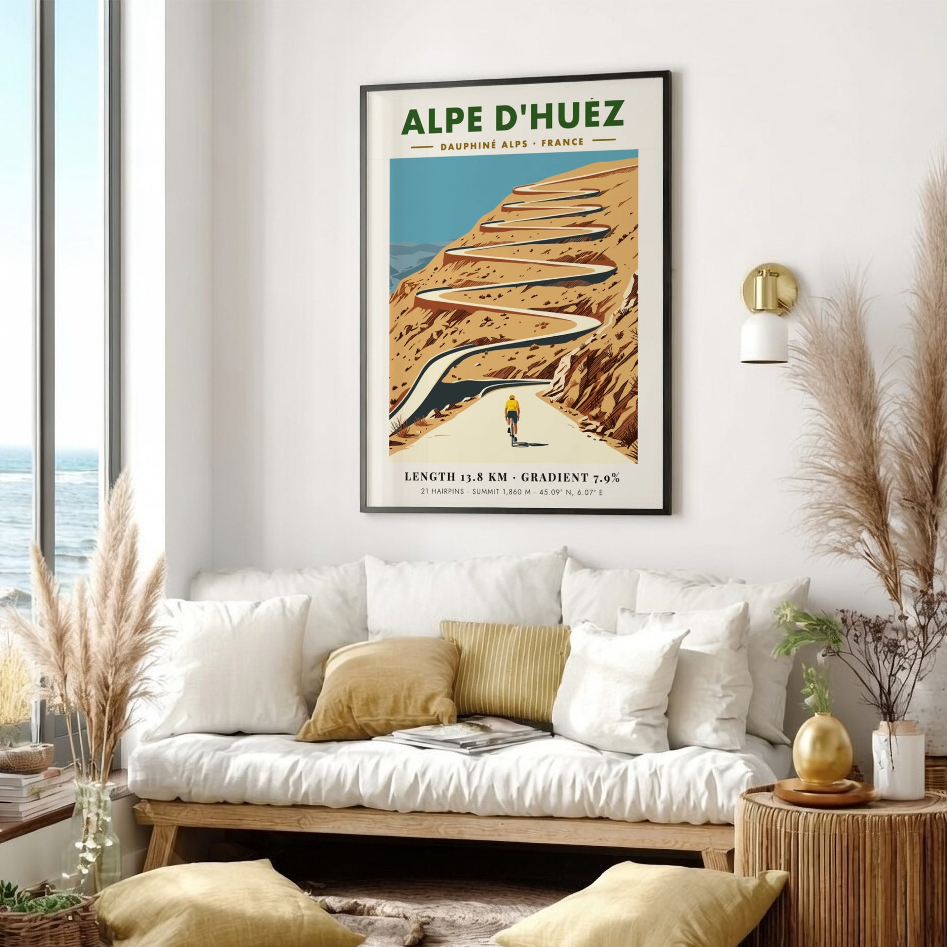 Poster featuring a lone cyclist climbing the winding Alpe D'Huez road in France.