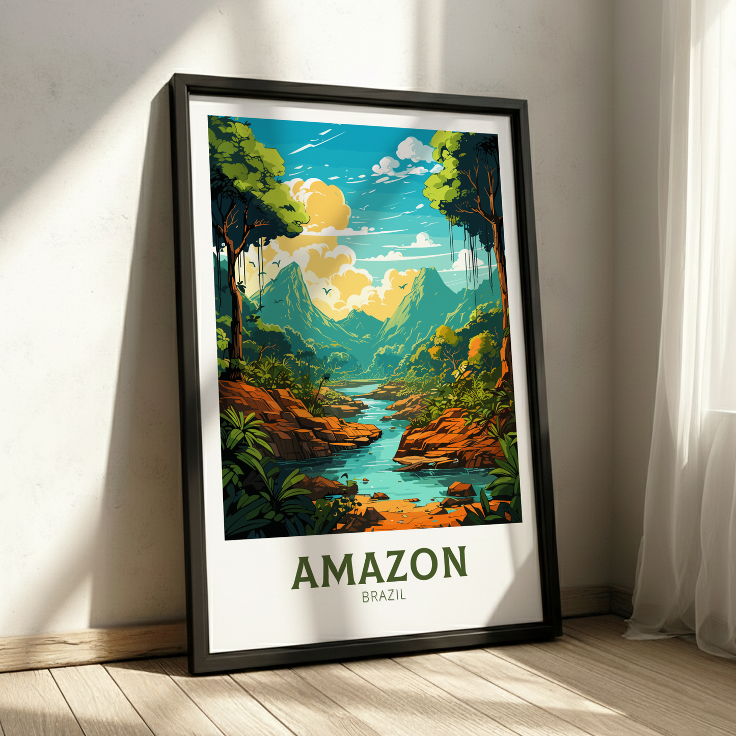Framed poster of the Amazon rainforest with a river and mountains, placed on a wooden floor.